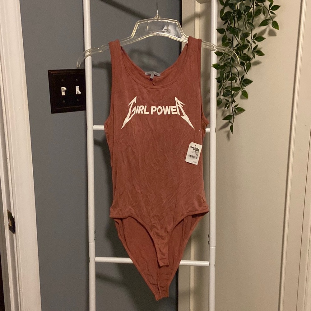 Charlotte Russe GIRL POWER leotard in a mauve color